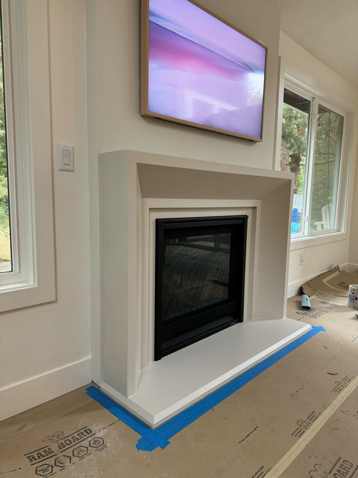 Cast stone newport fireplace in Subtle Gray — living room