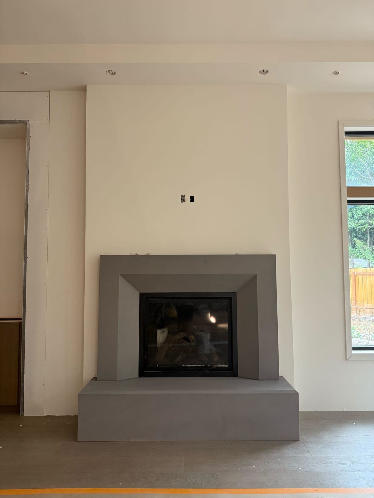 Cast stone custom monaco fireplace in Natural Stone