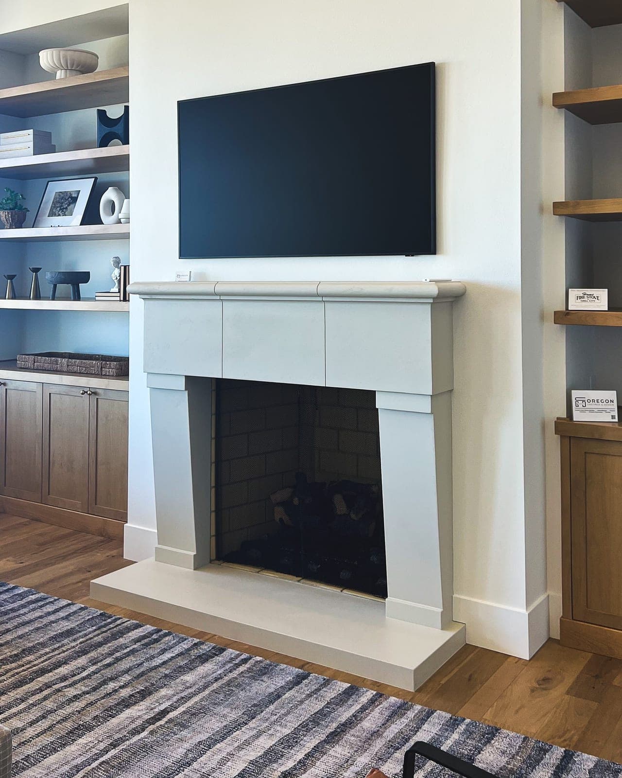 Cast stone meduri fireplace in Subtle Gray — living room