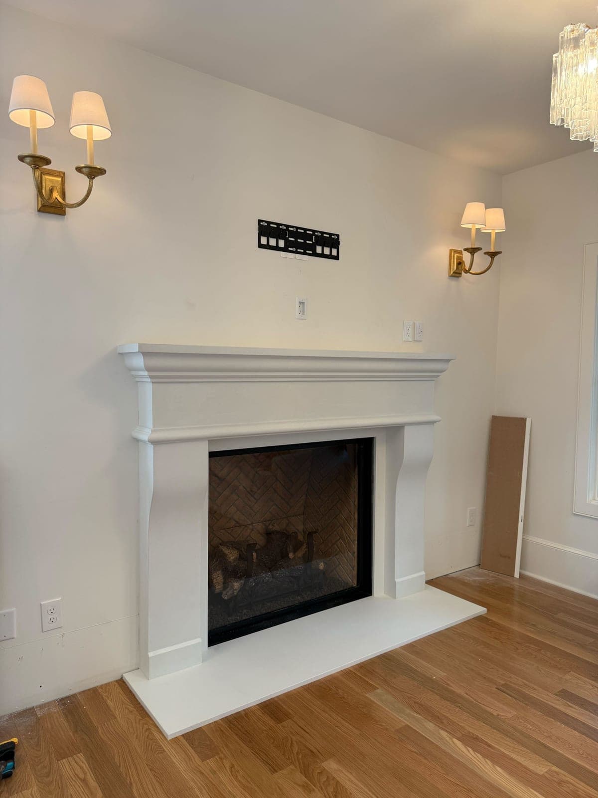 Cast stone custom new french fireplace in Italian White — living room