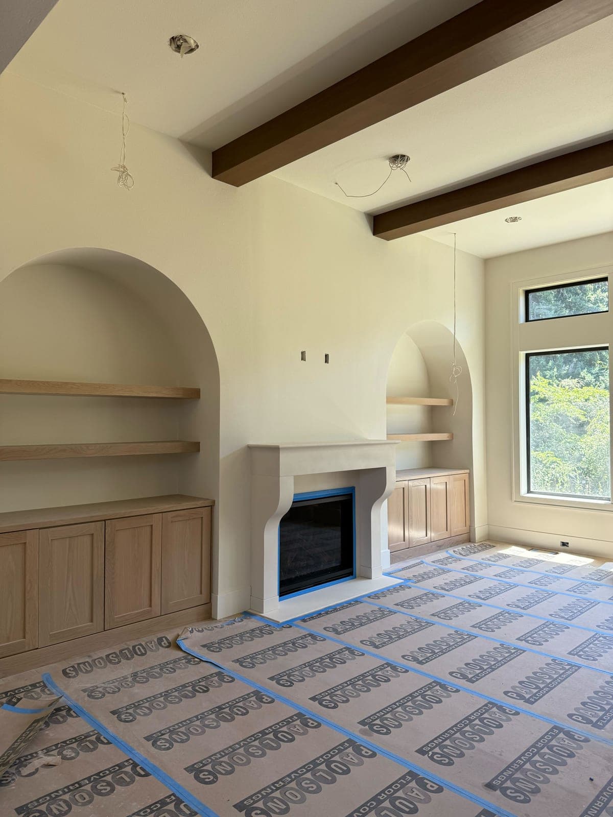 Cast stone custom verona fireplace in Meadow Mist — living room