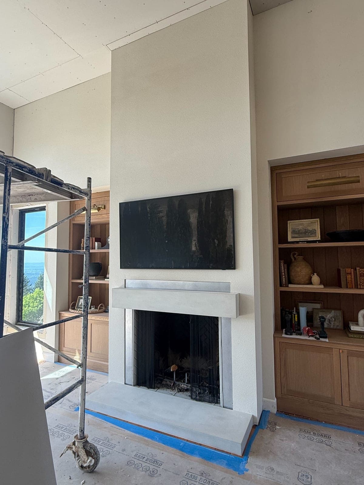 Cast stone custom mantel shelf & hearth in Subtle Gray — great room