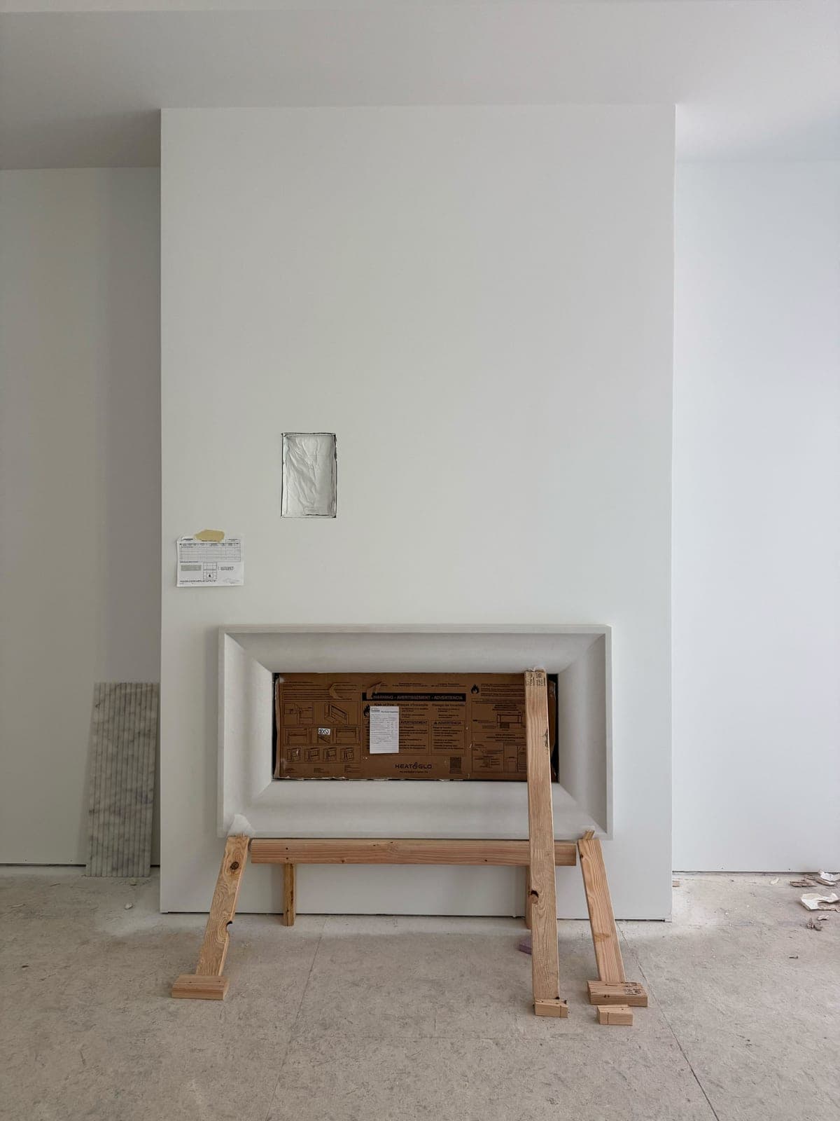 Cast stone custom fireplace in Italian White