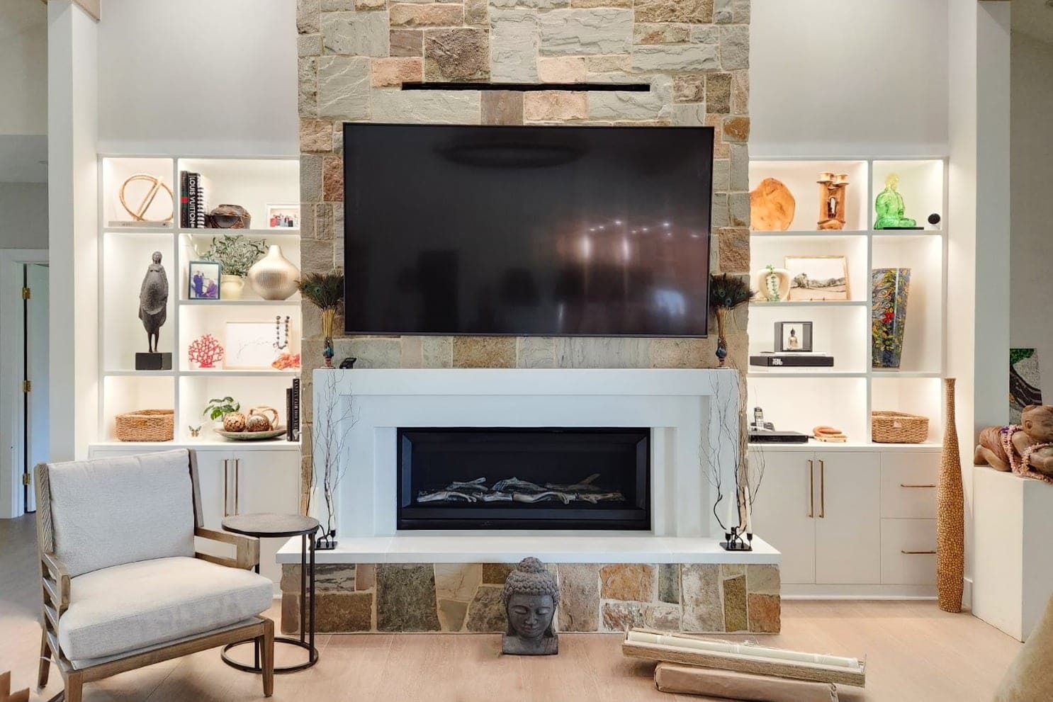 Cast stone custom fireplace in Italian White — living room