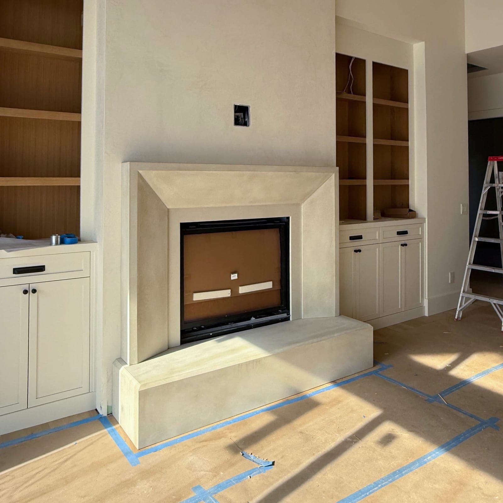 Cast stone custom vienna fireplace in Meadow Mist — living room