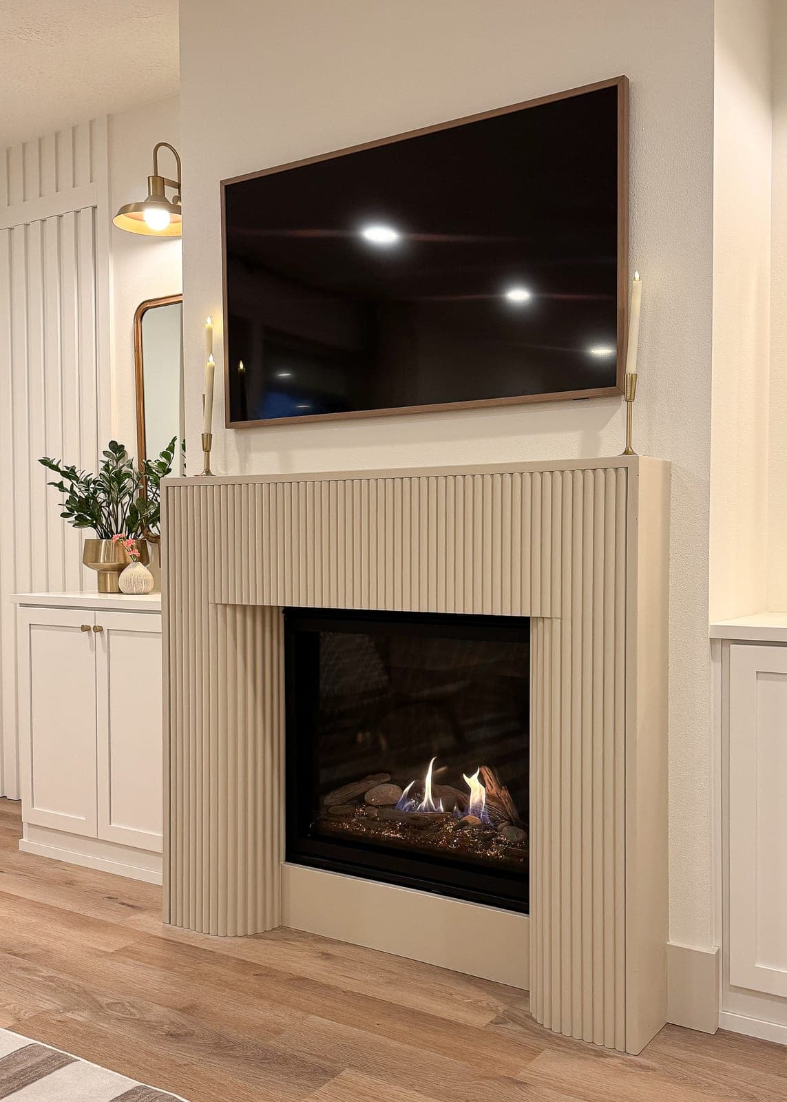 Cast stone custom florenza fireplace in Meadow Mist — living room