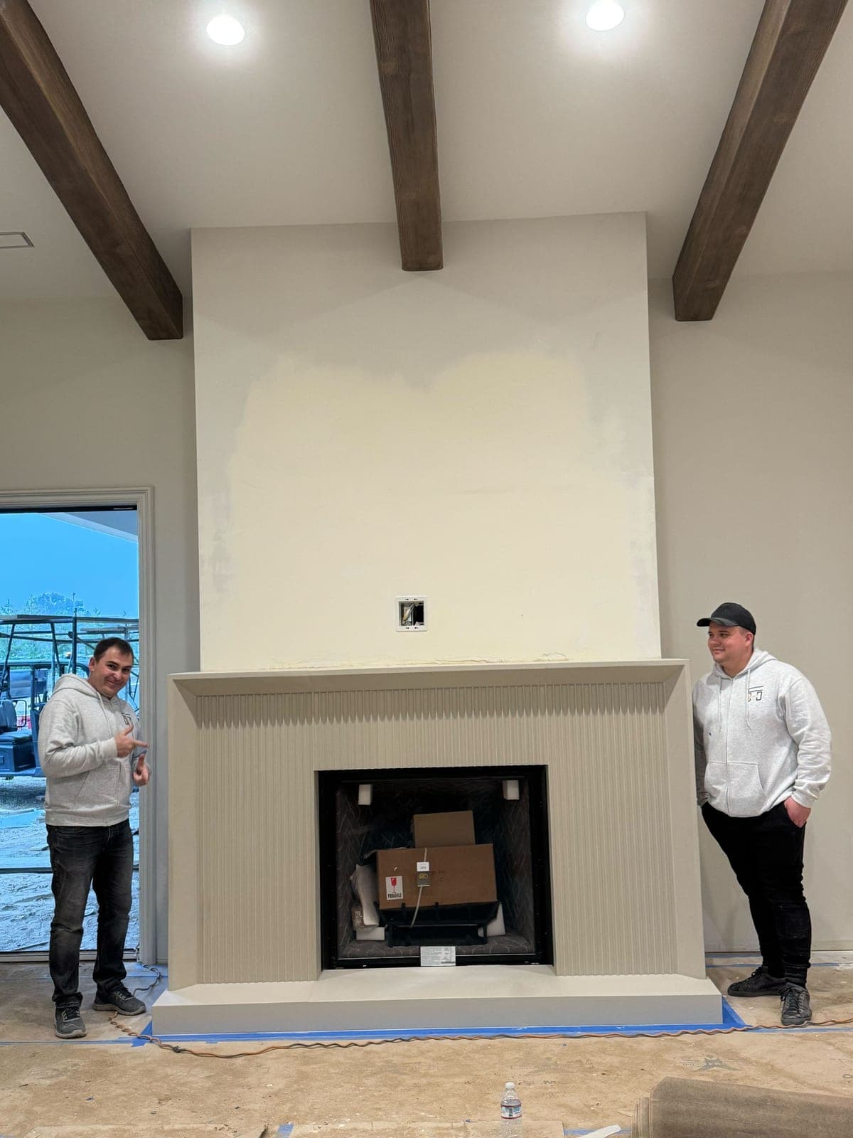 Cast stone custom fireplace in Subtle Gray — living room