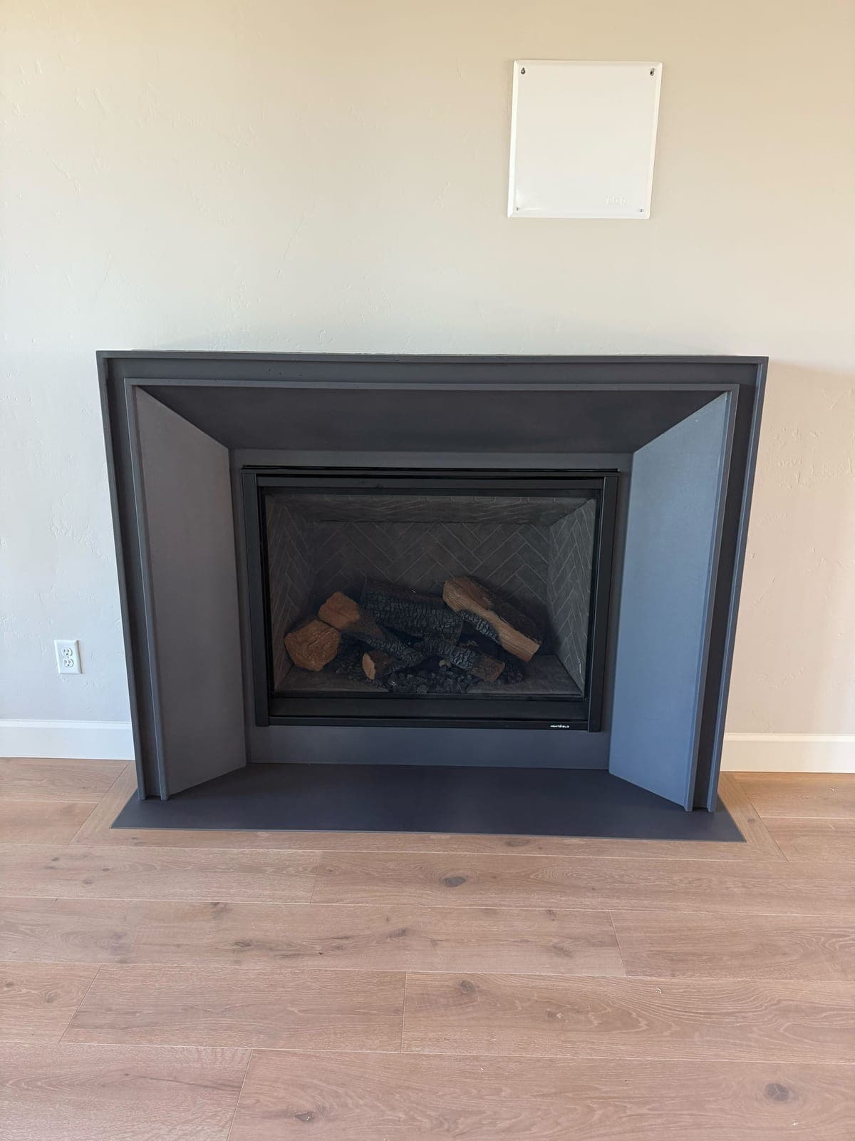 Cast stone lucca fireplace in Carbon Charcoal