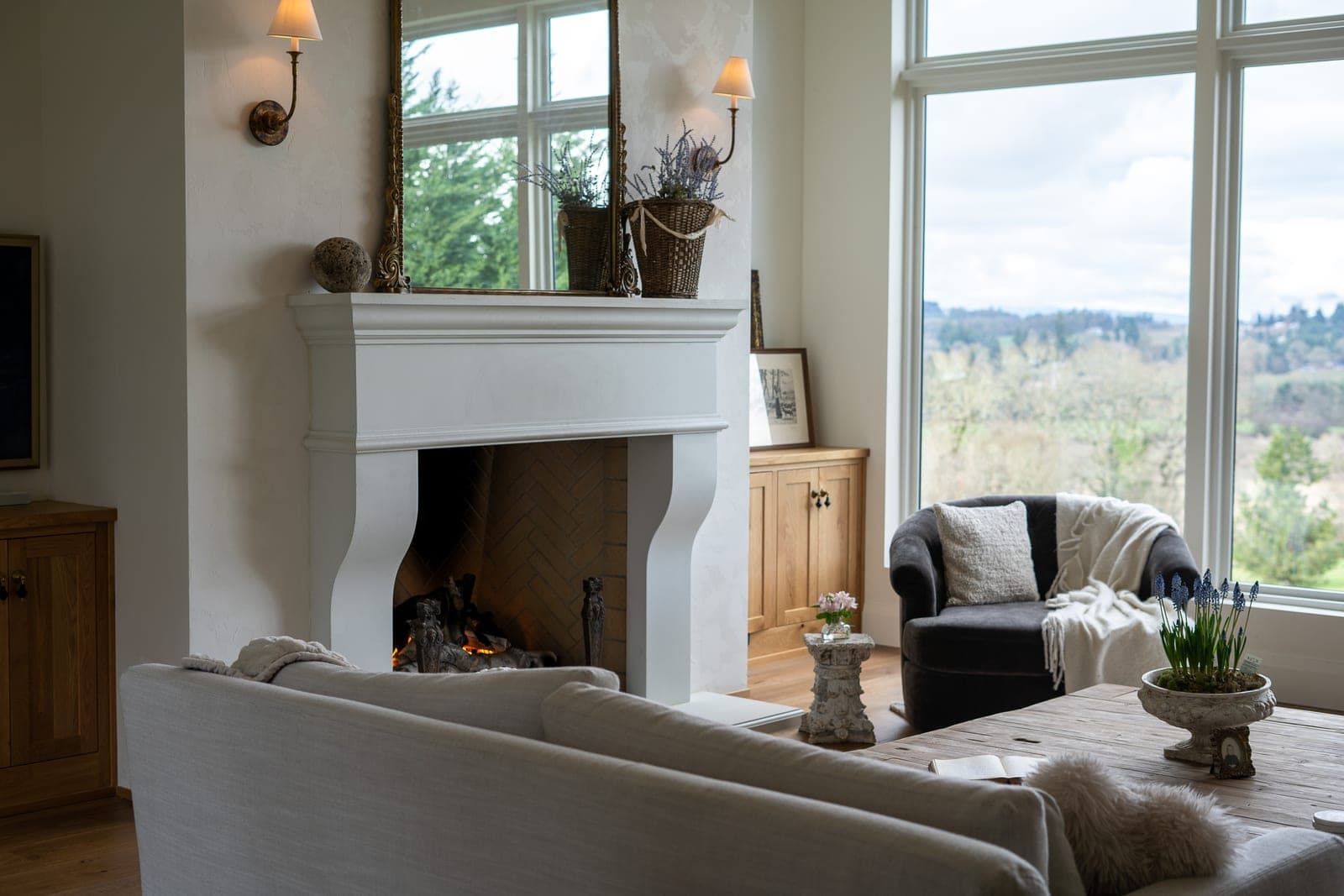 Cast stone custom new french fireplace in Italian White — living room