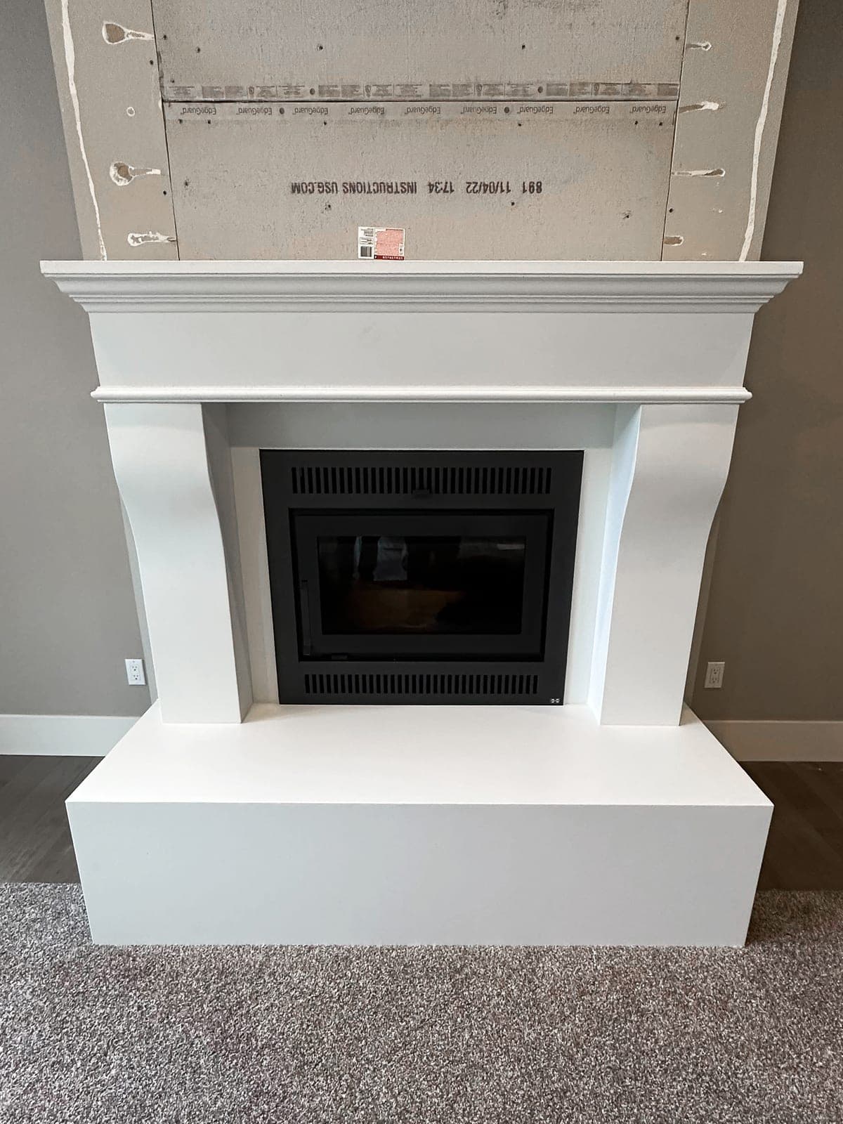 Installed cast stone surround — cast stone installation