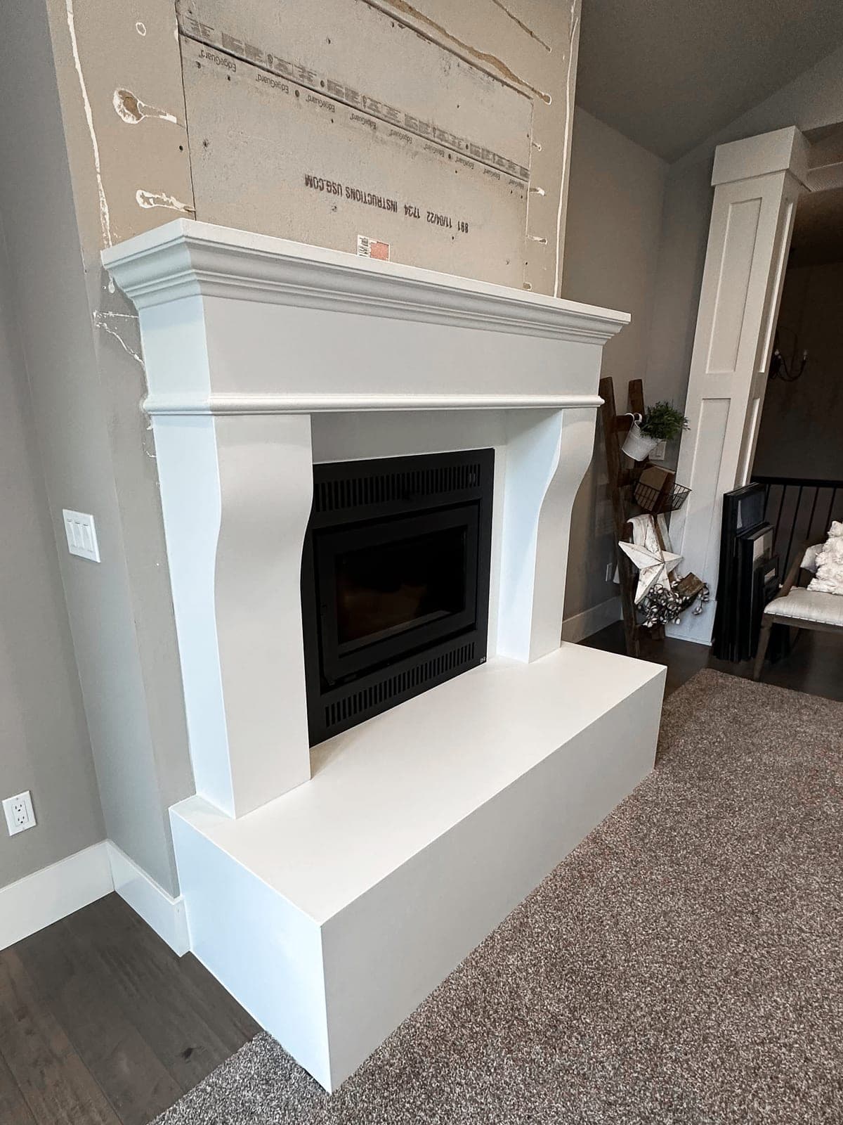 Installed cast stone surround — cast stone installation