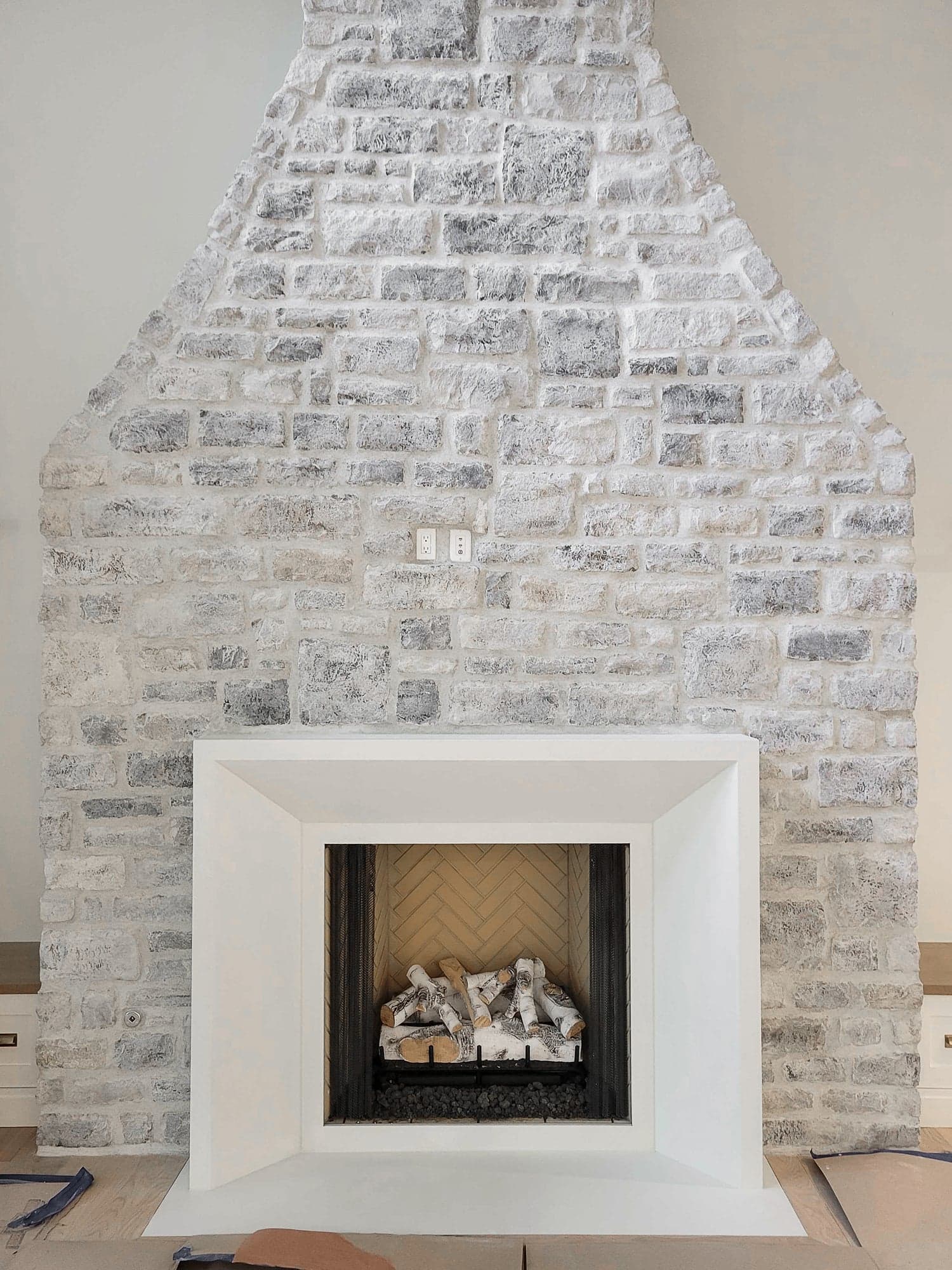 Cast stone piece on the Claxter Road workshop floor — material comparison reference.