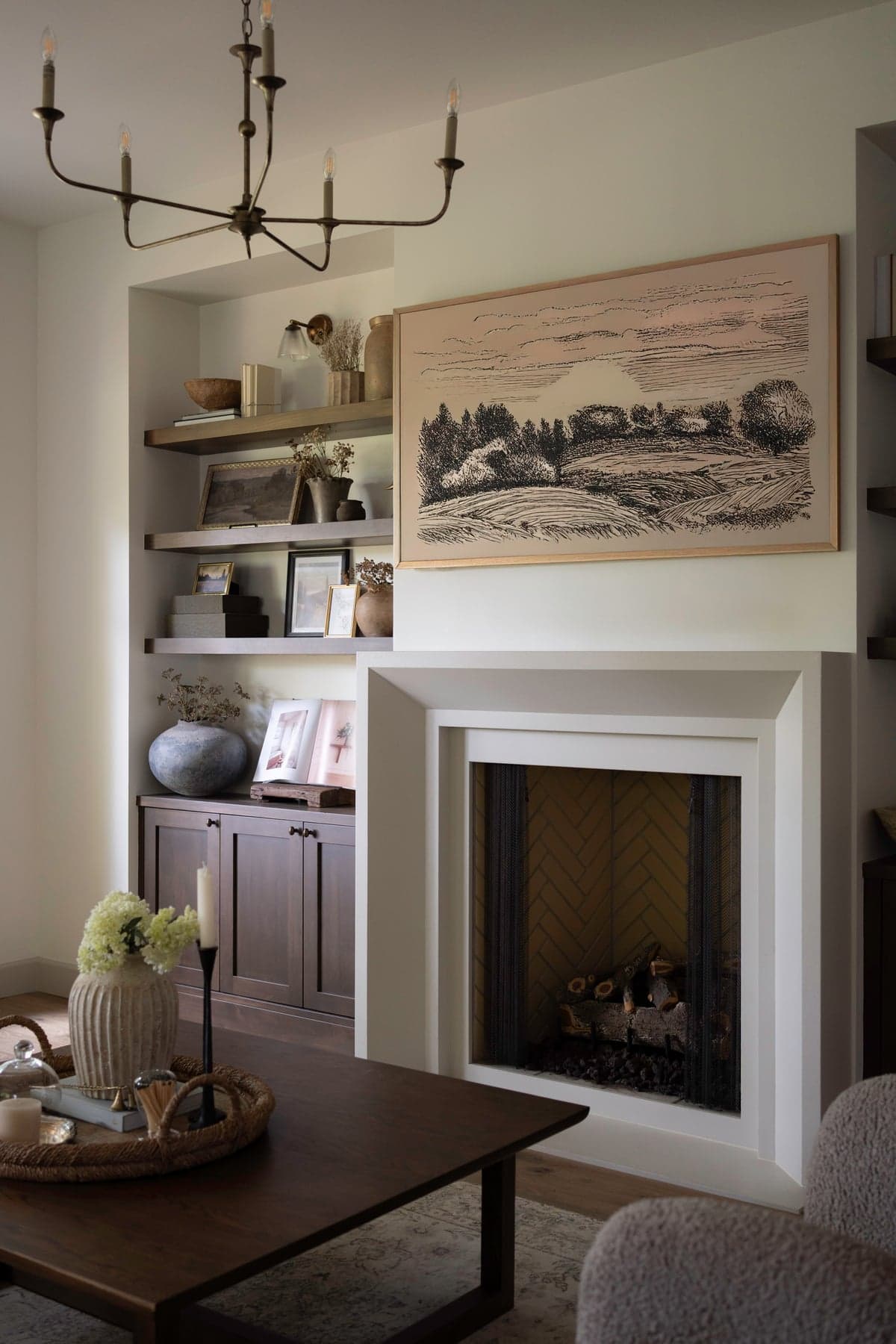 Cast stone fireplace surround installed in a luxury residence