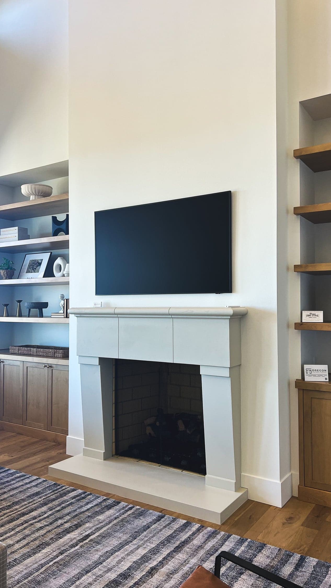 Bespoke cast stone mantel program installed in a residential interior