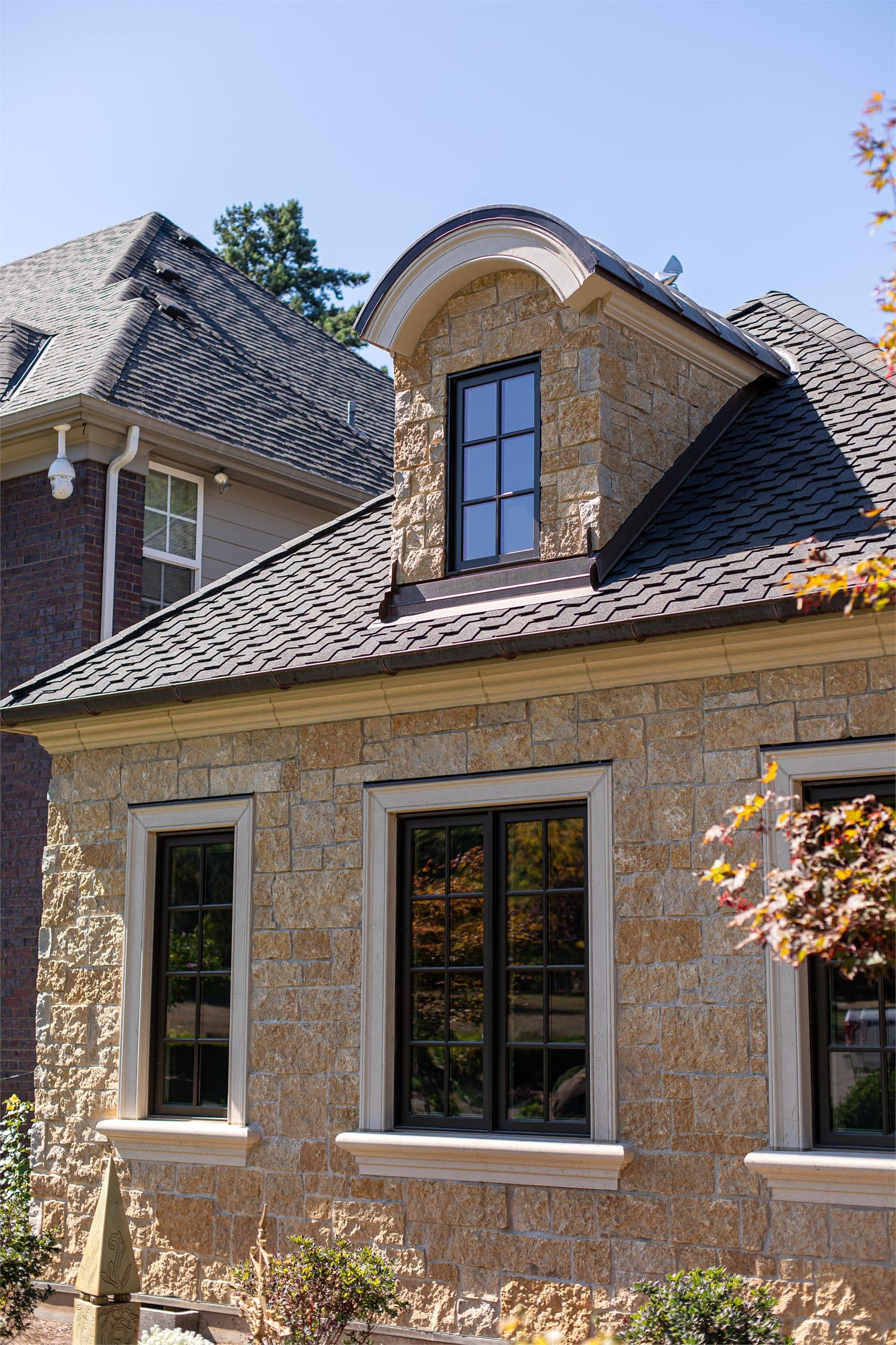 Exterior cast stone architectural element on a residential project