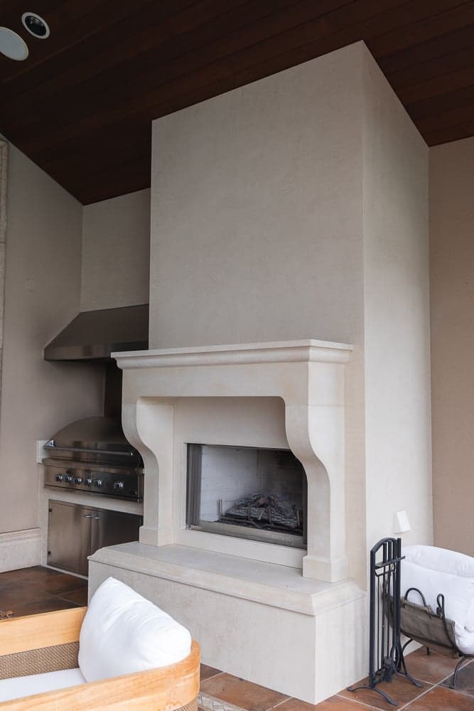 Crainic residence — two custom cast stone fireplaces, interior surround drawn from the great-room hearth.
