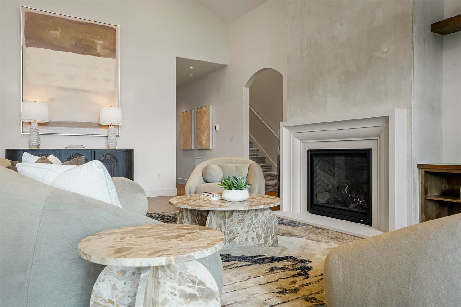 Foksha Homes — fireplace and millwork composition.