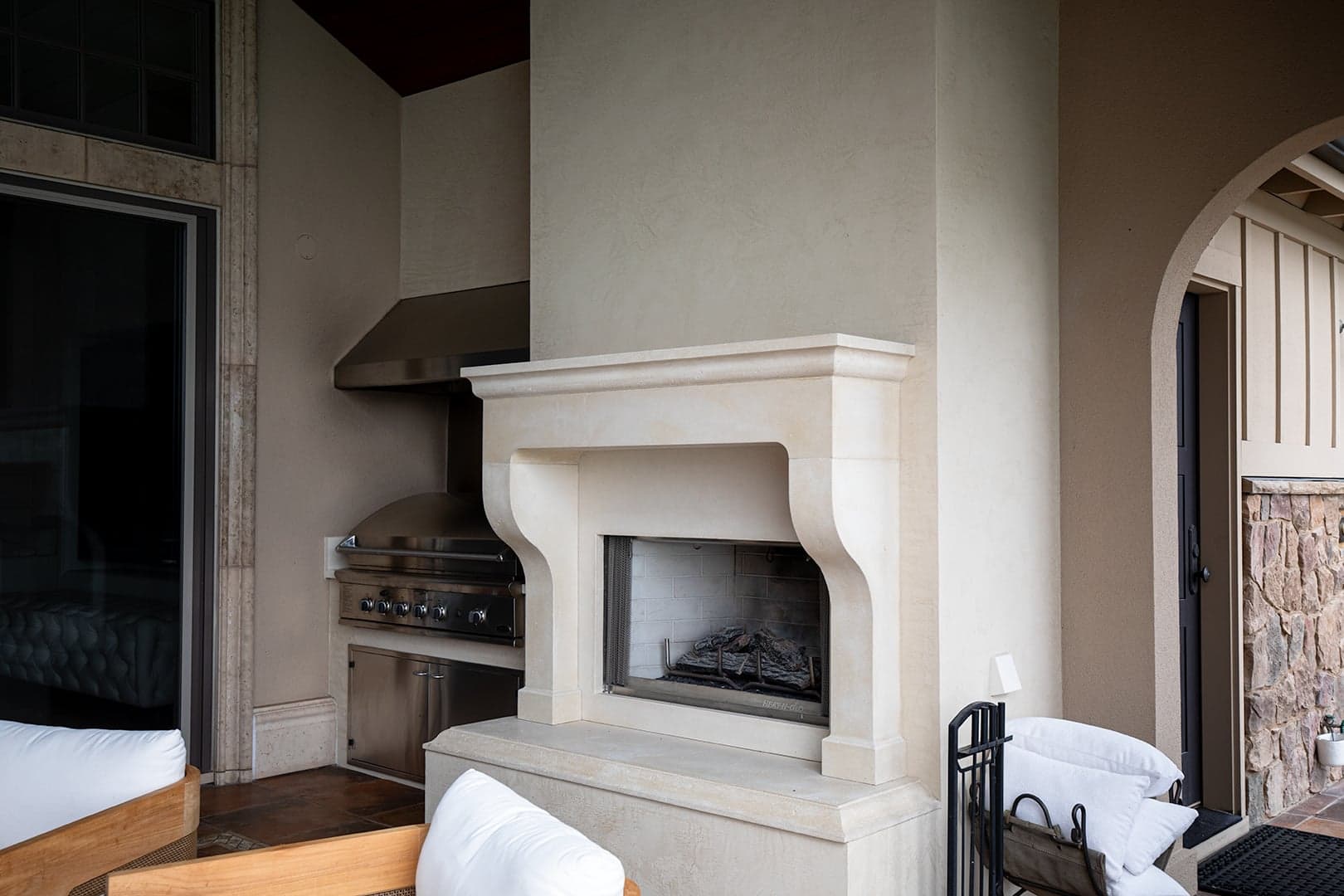 The Crainic cast stone surround installed in a finished room.