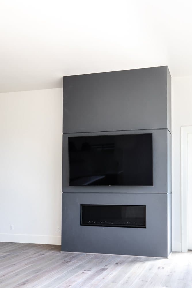 Kay Estate Vineyard — cast stone panel fireplace with custom wrap program.