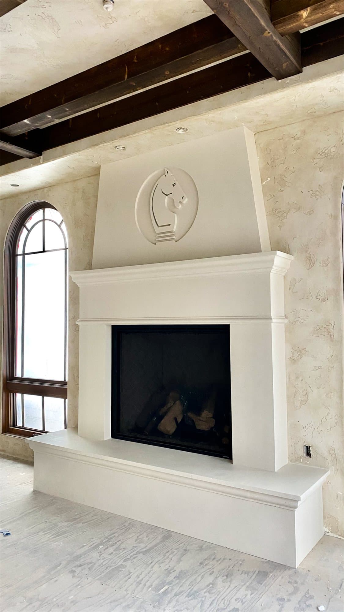 Lake Shore — custom straight legs framing the firebox.