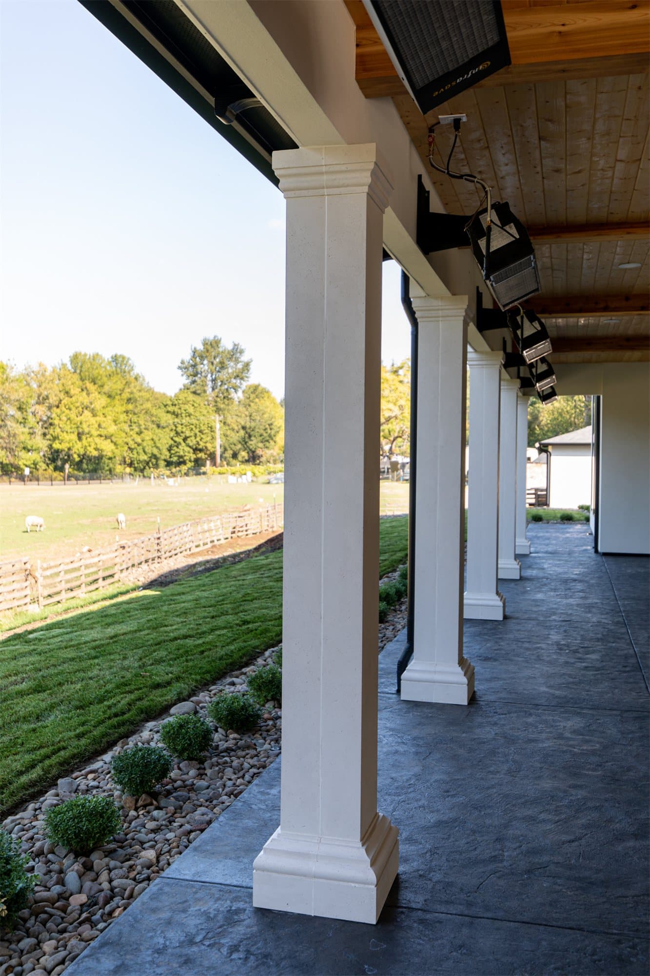 River Road Villa — exterior cast stone arch over the entrance.