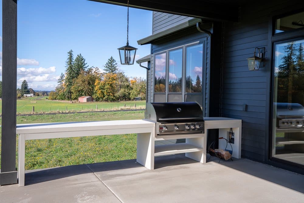 Small Residence — custom cast stone hood vent.
