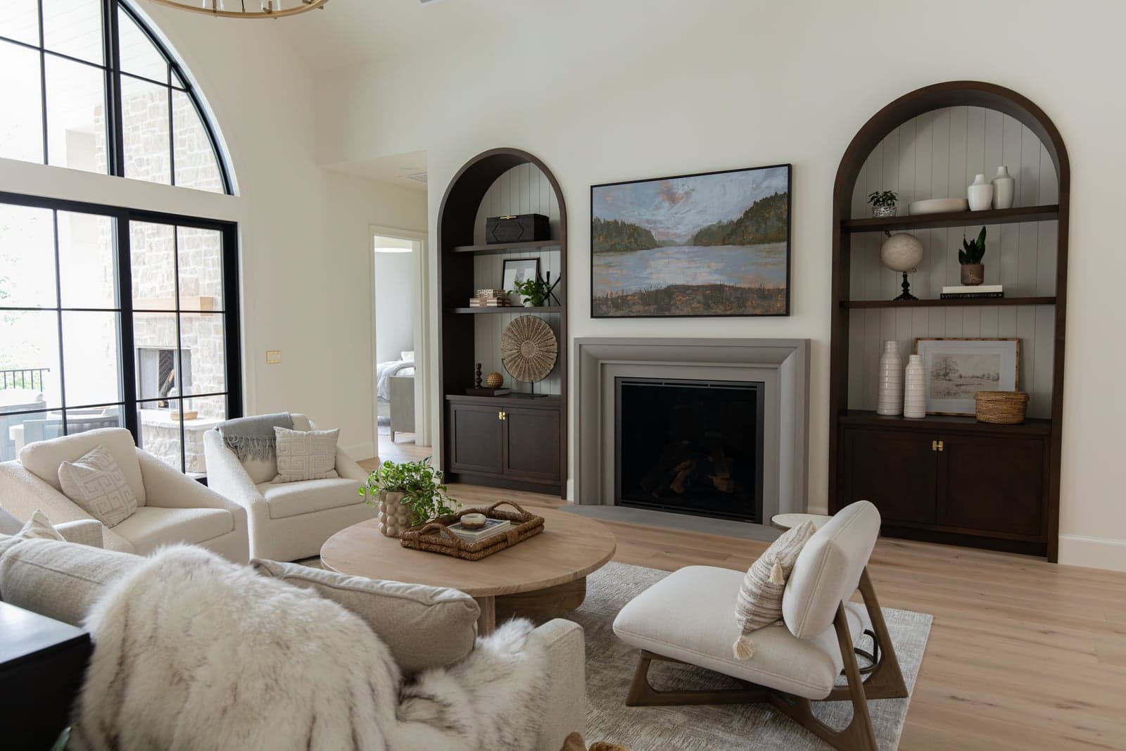 Stillwater Vista — Verona cast stone surround in a 20-foot vaulted great room at the 2026 Street of Dreams.
