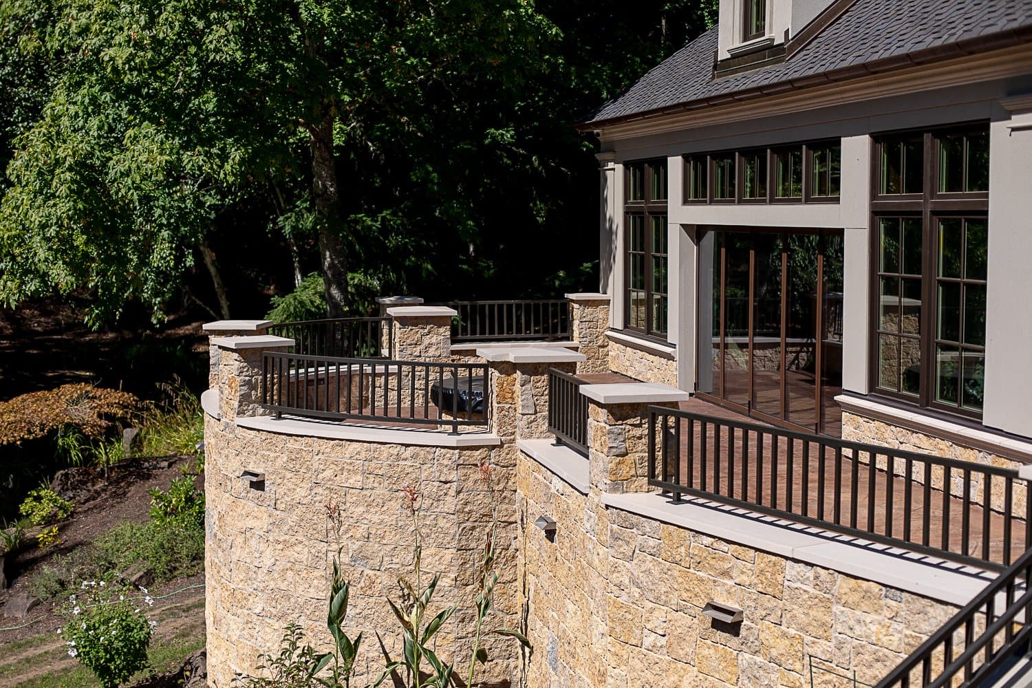Young Residence — cast stone cornice and water-table detail.